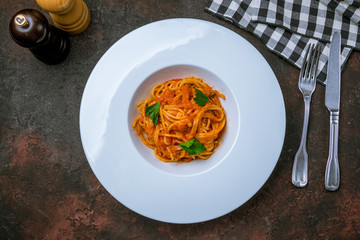 Spaghetti with vegetables in tomato sauce