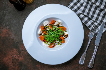 Caprese salad with mozzarella and tomato