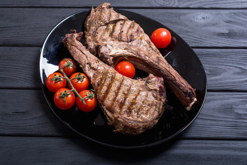 Grilled beef tomahawk steak
