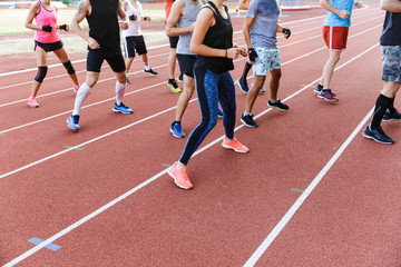 Group at the stadium outdoors training.