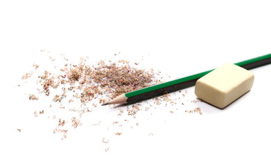 Graphite pencil and eraser with shavings isolated on white background