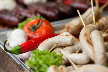 Delicious grilled sausages and Vegetable. Pork sausages fried in the fire.