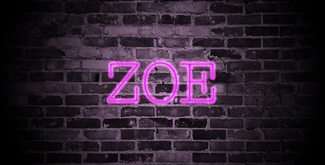 first name Zoe in pink neon on brick wall