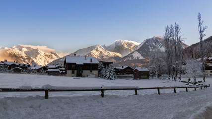 Courchevel Le Praz 1300 mt. Early Morning Sun Light Mountains