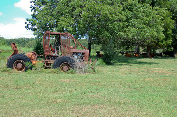 old grader in field