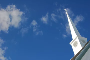 Deurstickers Church steeple with clouds in background © Jeff