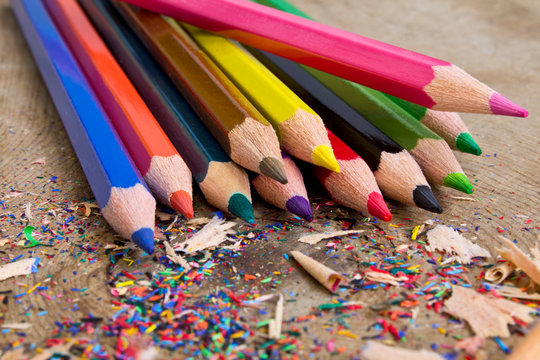 color pencils isolated on wooden background