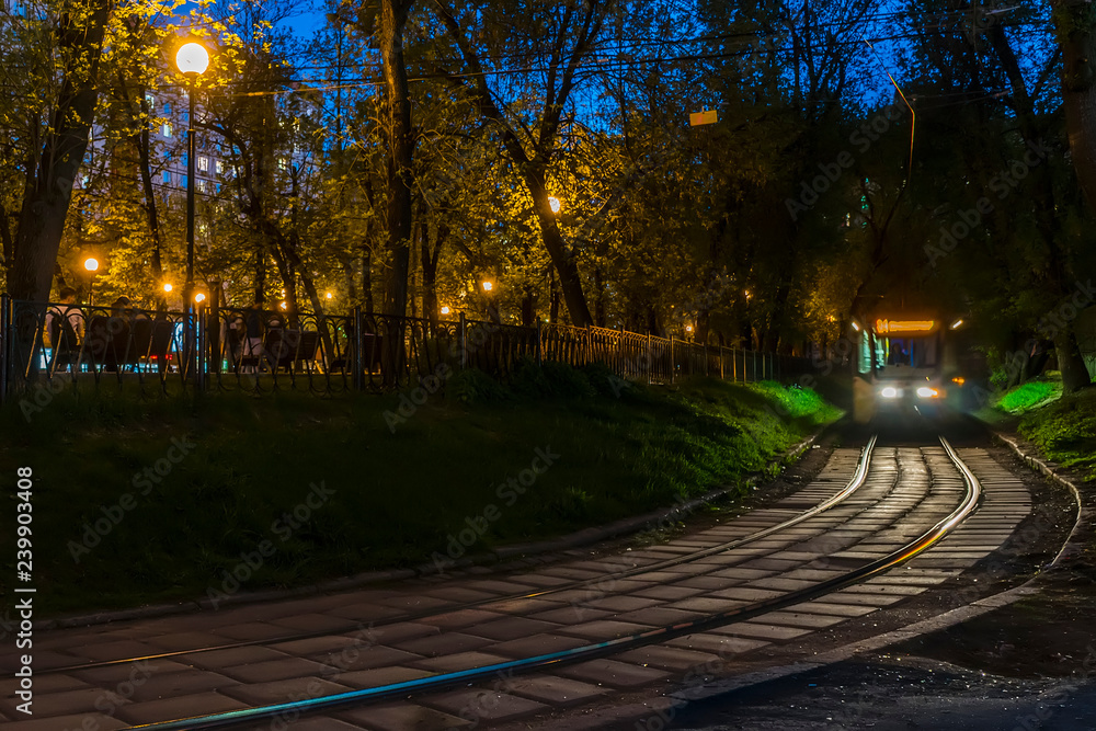 Wall mural The movement of trams on the bend of the road,