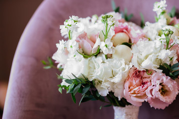 Wedding flowers, bridal bouquet closeup. Decoration made of roses, peonies and decorative plants, close-up, selective focus, nobody, objects