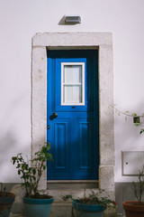 Small traditional blue door of the house in Lissabon, Lisboa Portugal