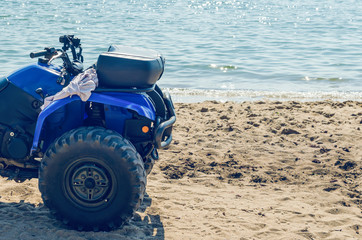 Atv on the sand by the sea