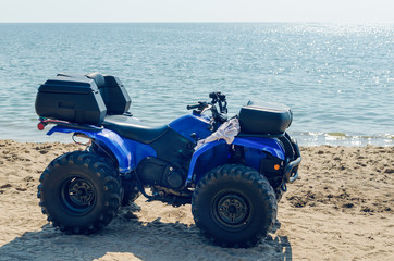 Atv on the sand by the sea