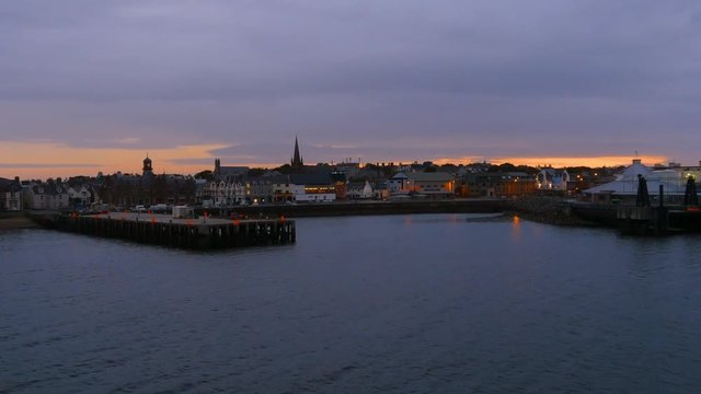 Stornoway early in the morning at dawn. Leaving the city by ferry. Two shots