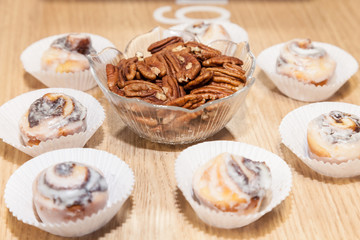 Cinamon and chocolate rolls cake and Pecan nuts 