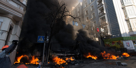 Street riots, fire in the city, protests
