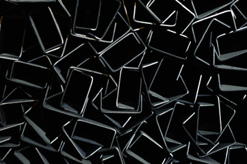 Abstract geometric background. Metal rectangles on a dark background.