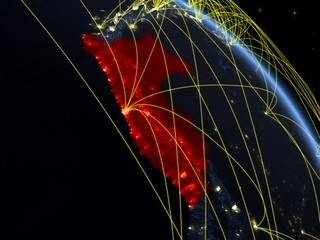 Peru from space on model of planet Earth at night with network. Concept of digital technology, connectivity and travel.