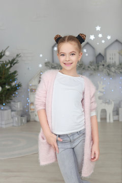 portrait of smiling little girl in christmas decorations