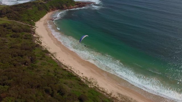 Amazing drone footage of paragliders out at sea