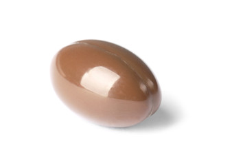 Pill on white background. Medical care and treatment
