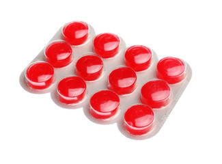 Pills in blister pack on white background