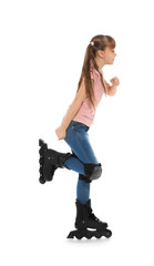 Little girl with inline roller skates on white background