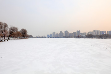 Fototapeta premium Urban buildings in the snow, China