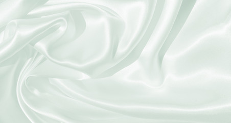 Naklejka premium The texture of the satin fabric of blue color for the background