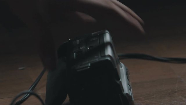 Playing an old mini-dv tape on a camcorder.