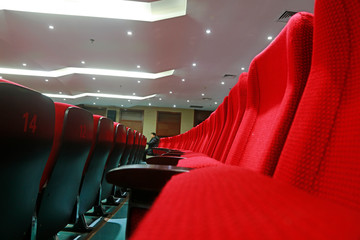 stacked chairs in the theatre, China