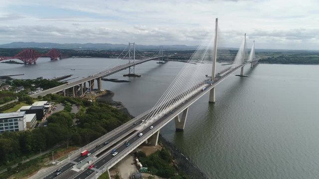 Aerial view of modern cable-stayed Queensferry Crossing bridge over the Firth of Forth estuary near Edinburgh in Scotland