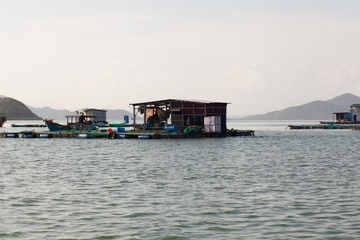 Floating fisherman house on the sea in Vietnam
