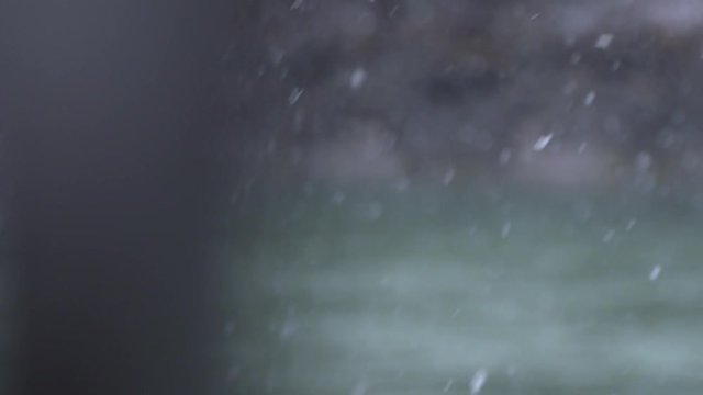Snowfall in Tyrol, detail shot with unsharp stuff in the front.