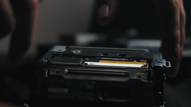 Playing an old mini-dv tape on a camcorder.