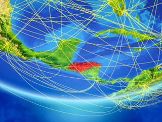 Honduras on model of planet Earth with network representing travel and communication.