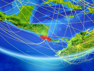 Costa Rica on model of planet Earth with network representing travel and communication.