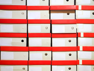 Row of shoes box stacked in storage