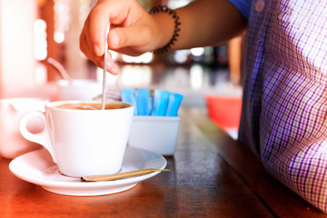 young woman with cup of coffee