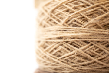 roll of pastel color tone natural dye thread, white copy space on left