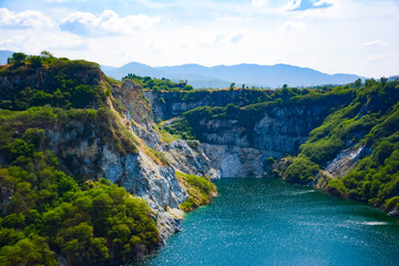 This is a beautiful nature of the river and the hills which we call  Grand canyon. This is an old mine that has not been used for a long time and has become a large blue water source in the valley