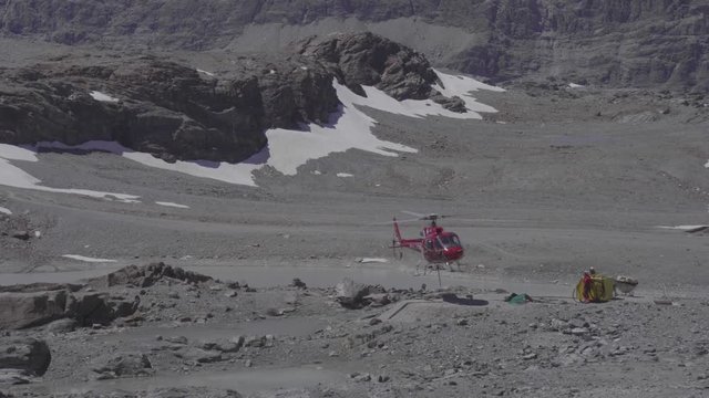Helicopter taking-off with long-line attached - Zermatt, Switzerland