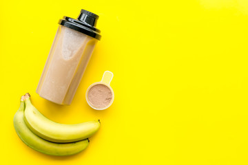 sport diet with protein nutrition on yellow background top view mock up