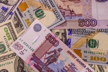 Fototapeta na wymiar Background of the different american and russian banknotes