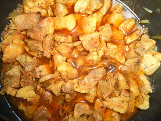  roast meat with onions and spices in its own juice