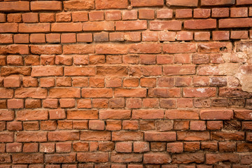 crumbling brick wall