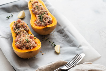 Pumpkin with minced meat with thyme, garlic. Healthy seasonal autumn cuisine. Copy space.