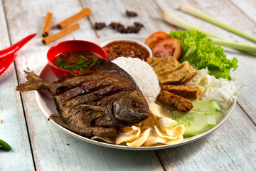 traditional malay indonesian fried pomfret fish rice