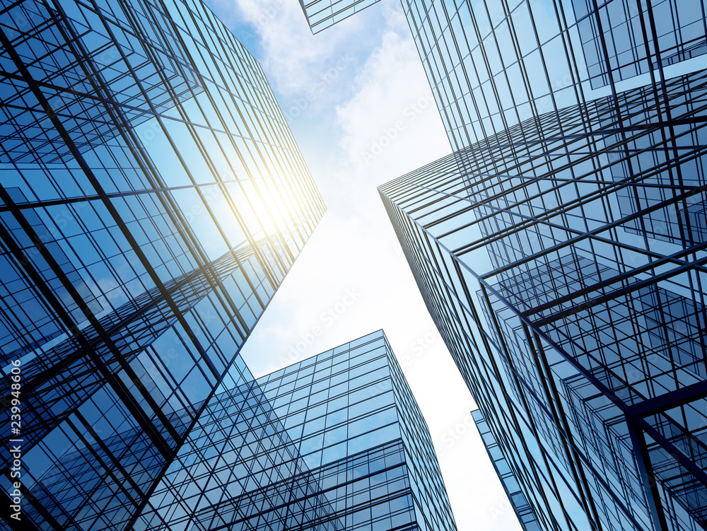 Poster view of high rise glass building and dark steel window system on blue clear sky background,business 