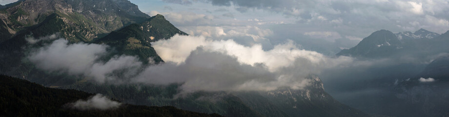 Fototapeta na wymiar Mountains And Clouds