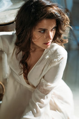 Elegant woman portrait studio shot. Attractive adult brunette sexy girl. Long beautiful healthy hair model girl stock image.